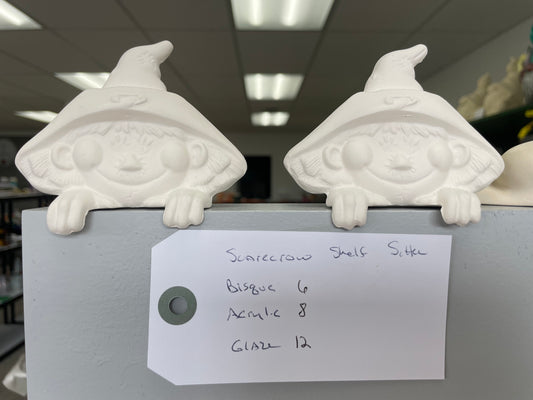 Scarecrow shelf sitter