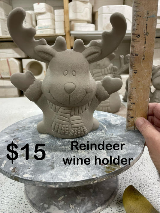 REINDEER  WINE BOTTLE HOLDERS-$15